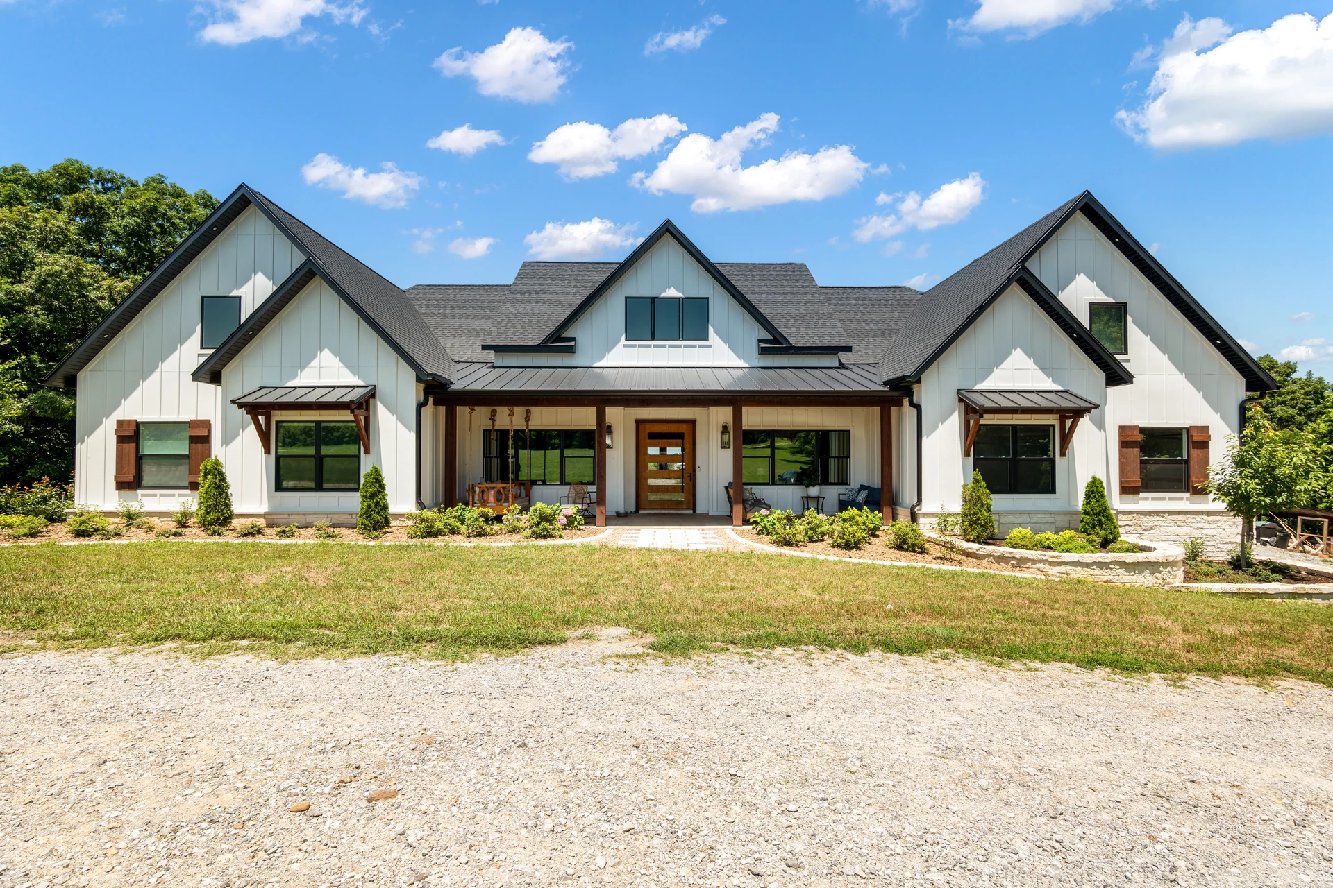 Gabled exterior with a timber-framed front porch