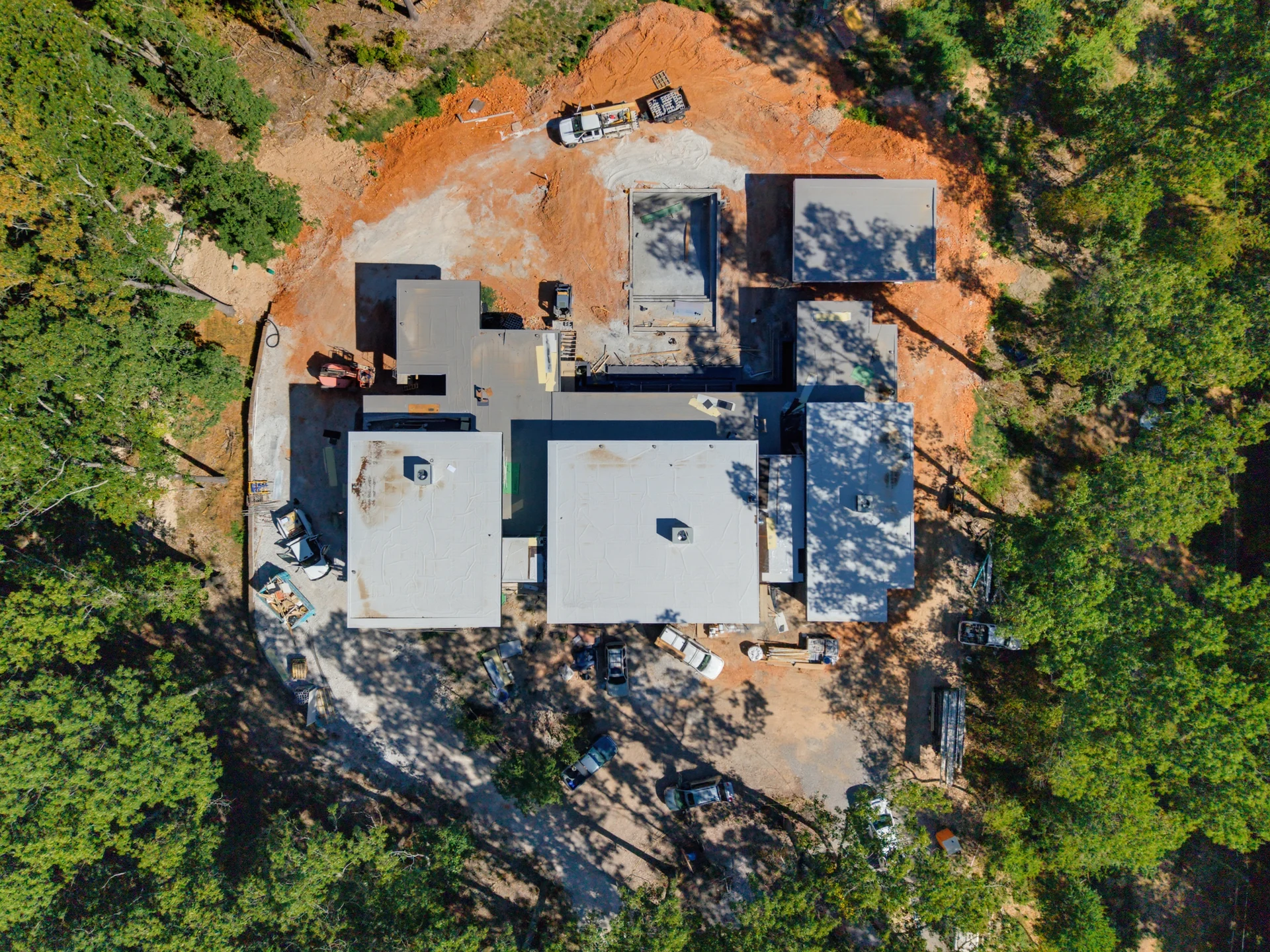 Overhead view of the roof plan and active construction site